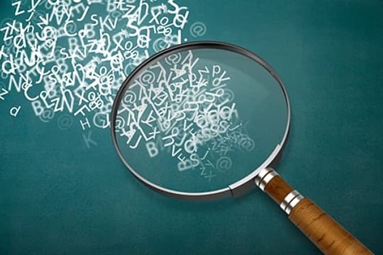 magnifying lens on words