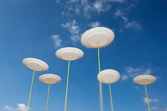Spinning plates representing competing priorities